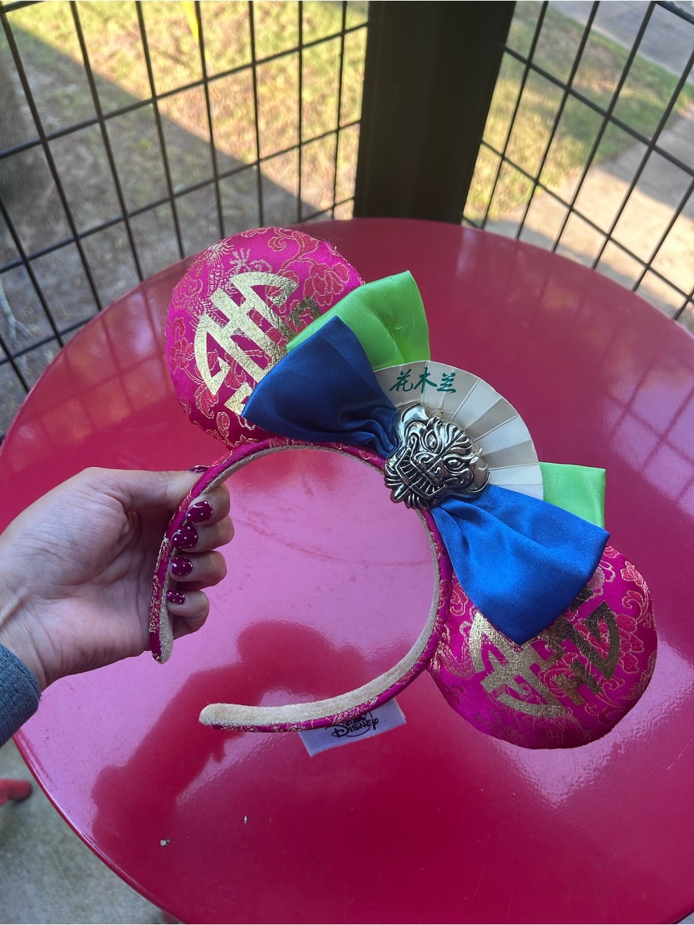 Disney Mulan Minnie Mouse ears with gold  pattern in good condition